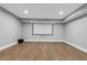 Finished basement home theater with projector and surround sound at 1393 Lanier Pl, Atlanta, GA 30306