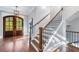 Elegant hardwood staircase with black metal balusters at 1393 Lanier Ne Pl, Atlanta, GA 30306