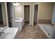 Double vanity bathroom with garden tub at 2815 Shoemaker Ln, Snellville, GA 30039