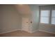 Bedroom with neutral walls, window, and closet at 2815 Shoemaker Ln, Snellville, GA 30039