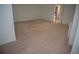 Spacious bedroom with carpet flooring and access to a bathroom at 2815 Shoemaker Ln, Snellville, GA 30039