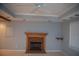 Living room featuring a brick fireplace and ceiling fan at 2815 Shoemaker Ln, Snellville, GA 30039