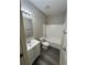 Clean bathroom with a tub, shower, and white vanity at 30 Sportsman Path, Dallas, GA 30157