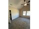 Spacious bedroom with carpet, ceiling fan, and attached bathroom at 30 Sportsman Path, Dallas, GA 30157