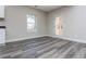 Bright dining area with vinyl flooring and door leading outdoors at 30 Sportsman Path, Dallas, GA 30157