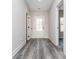 Bright entryway with gray vinyl plank flooring at 30 Sportsman Path, Dallas, GA 30157