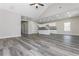 Open living room and kitchen with vinyl flooring at 30 Sportsman Path, Dallas, GA 30157