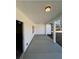 Covered porch with concrete flooring and white siding at 30 Sportsman Path, Dallas, GA 30157