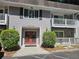 Apartment building with double doors and landscaping at 3142 Reeves Se St, Smyrna, GA 30080