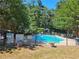 Community swimming pool with lounge chairs at 3142 Reeves Se St, Smyrna, GA 30080