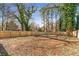 Large backyard with a wooden privacy fence at 3463 Victoria St, Atlanta, GA 30337