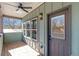 Charming deck with wood flooring, ceiling fan, and exterior door at 3463 Victoria St, Atlanta, GA 30337