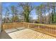 New deck with wood railings, offering a backyard view at 3463 Victoria St, Atlanta, GA 30337