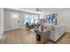 Living room featuring hardwood floors, beige couch and a wooden coffee table at 3463 Victoria St, Atlanta, GA 30337