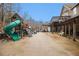 Large backyard with playground and ample paved area at 1275 Poole Bridge Rd, Hiram, GA 30141