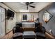 Bedroom with a queen bed, two armchairs, and ceiling fan at 1275 Poole Bridge Rd, Hiram, GA 30141