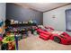 bedroom with race car bed and toy storage at 1275 Poole Bridge Rd, Hiram, GA 30141