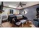 Bedroom with a queen bed, two armchairs, and ceiling fan at 1275 Poole Bridge Rd, Hiram, GA 30141