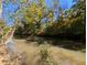 Serene creek bordering the property, offering a tranquil setting at 1275 Poole Bridge Rd, Hiram, GA 30141