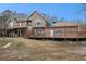 Two story house with wrap around deck, and screened porch at 1275 Poole Bridge Rd, Hiram, GA 30141