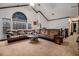 Large living room with vaulted ceiling, and brown sectional sofa at 1275 Poole Bridge Rd, Hiram, GA 30141