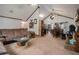 Open concept living room and dining area with vaulted ceiling at 1275 Poole Bridge Rd, Hiram, GA 30141