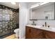 Modern bathroom with double vanity and geometric tile at 404 Granville Ct, Atlanta, GA 30328
