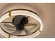 Modern ceiling fan with LED light and gold accents at 404 Granville Ct, Atlanta, GA 30328