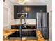 Modern kitchen with stainless steel appliances and a herringbone wood countertop at 404 Granville Ct, Atlanta, GA 30328