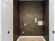 Laundry room with geometric patterned wallpaper at 404 Granville Ct, Atlanta, GA 30328