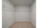 Spacious walk-in closet with wire shelving at 108 Dalston Cv, Stockbridge, GA 30281