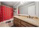 Bathroom with double vanity, granite countertop, and a shower/tub combo at 121 Harmony Oaks Trl, Canton, GA 30115