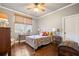 Charming bedroom featuring wood floors and a tranquil atmosphere at 121 Harmony Oaks Trl, Canton, GA 30115