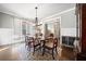 Formal dining room with hardwood floors and a wood table set at 121 Harmony Oaks Trl, Canton, GA 30115