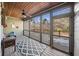 Relaxing screened porch with wood flooring and wooded views at 121 Harmony Oaks Trl, Canton, GA 30115