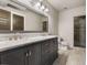 Basement bathroom with double vanity and marble top at 5905 Kayron Dr, Atlanta, GA 30328