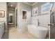 Spa-like bathroom with freestanding tub and walk-in shower at 5905 Kayron Dr, Atlanta, GA 30328