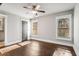 Simple bedroom with hardwood floors and neutral walls at 5905 Kayron Dr, Atlanta, GA 30328