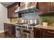 Stainless steel appliances and granite countertops in this kitchen at 5905 Kayron Dr, Atlanta, GA 30328