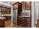 Modern kitchen with stainless steel appliances and dark wood cabinets at 5905 Kayron Dr, Atlanta, GA 30328