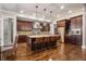 Gourmet kitchen boasts stainless steel appliances, granite countertops, and an island with seating at 5905 Kayron Dr, Atlanta, GA 30328