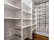 Well-organized pantry with ample shelving and pull-out drawers at 5905 Kayron Dr, Atlanta, GA 30328