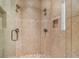 Large walk-in shower with tile surround and dual shower heads at 5905 Kayron Dr, Atlanta, GA 30328