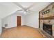 Living room with stone fireplace and wood flooring at 1482 Kings Ridge Dr, Norcross, GA 30093