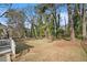 Spacious backyard with grassy area and large trees at 2591 Connally Dr, Atlanta, GA 30344