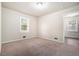 Bright bedroom with neutral carpeting and window at 2591 Connally Dr, Atlanta, GA 30344