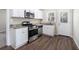 Modern kitchen with stainless steel appliances and granite countertops at 2591 Connally Dr, Atlanta, GA 30344