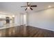 Open concept living room with hardwood floors and kitchen views at 47 Rosemont Ct, Hiram, GA 30141