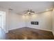 Bright living room features hardwood floors, recessed lighting, and a modern fireplace at 47 Rosemont Ct, Hiram, GA 30141