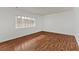 Spacious bedroom with hardwood floors and large window at 1705 Monroe Ne Dr # B05, Atlanta, GA 30324